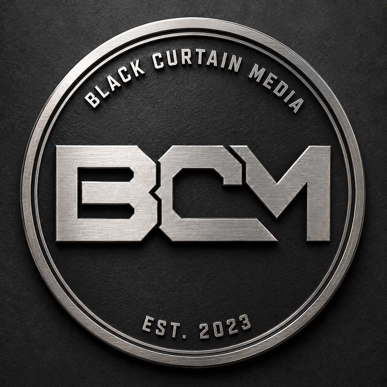 Black Curtain Media brushed steel medallion